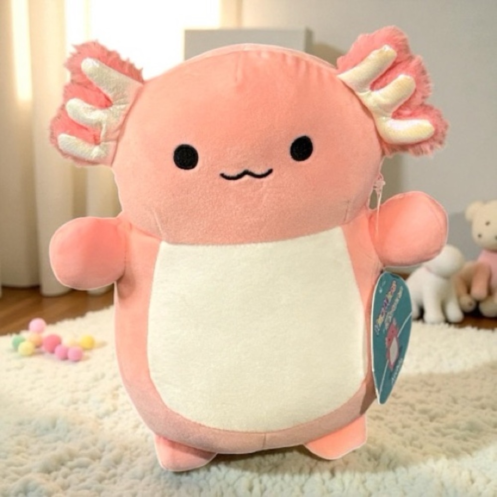 Archie the Pink Axolotl, a Squishmallows plush toy.
